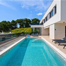 5 bedroom beachfront villa with heated pool near Omis, sleeps 9